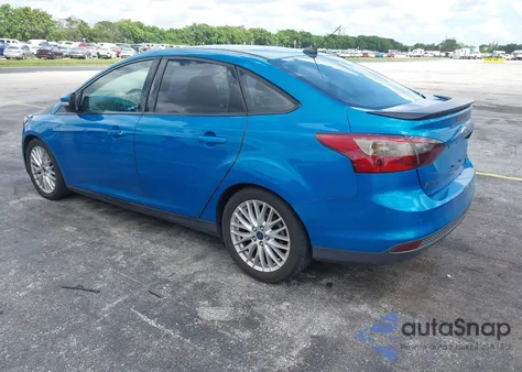 2014 Ford Focus Titanium z USA, uszkodzony, nr VIN 1FADP3J27EL204904